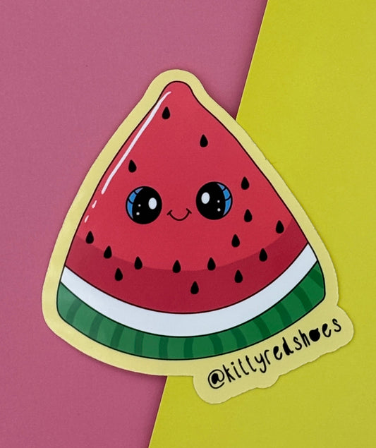 A sticker of a cute smiling pink, green and white watermelon slice and text @kittyredshoes with a yellow background.